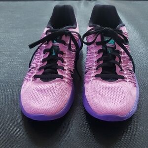 Nike Pink and Purple Athletic Shoes with Breathable Upper and Low-Top Design